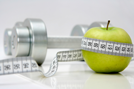 Apple and Weight Set with Tape Measure Around