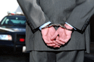 Executive in Handcuffs